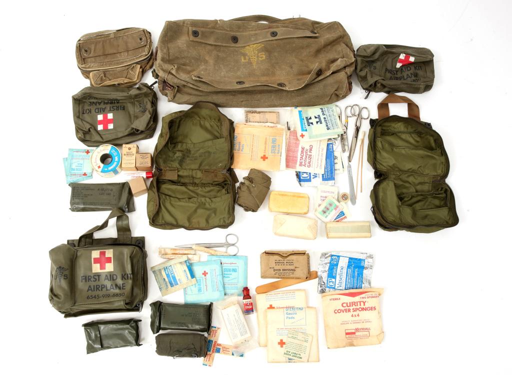 USAF AIRPLANE FIRST AID KIT LOT OF 7: USAF AIRPLANE FIRST AID KIT LOT OF 7 Korea - Vietnam War era, USAF Airplane first aid kit lot, includes: 2- First aid kit, general purpose nylon pouch with some contents. 3- first aid kit, airplane po