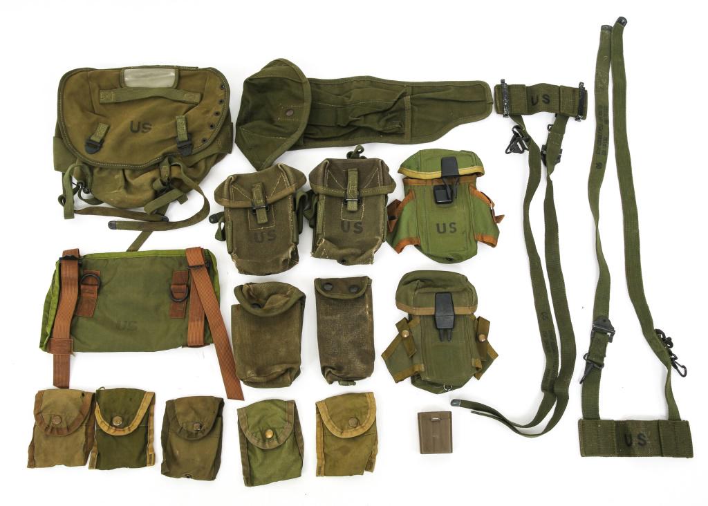 VIETNAM WAR US ARMY FIELD GEAR LOT OF 17: VIETNAM WAR US ARMY FIELD GEAR LOT OF 17 Vietnam War, US Army field gear lot of 17. Early M56 canvas ammo pouches, nylon ammo pouches, straps, first aid kit pouches.