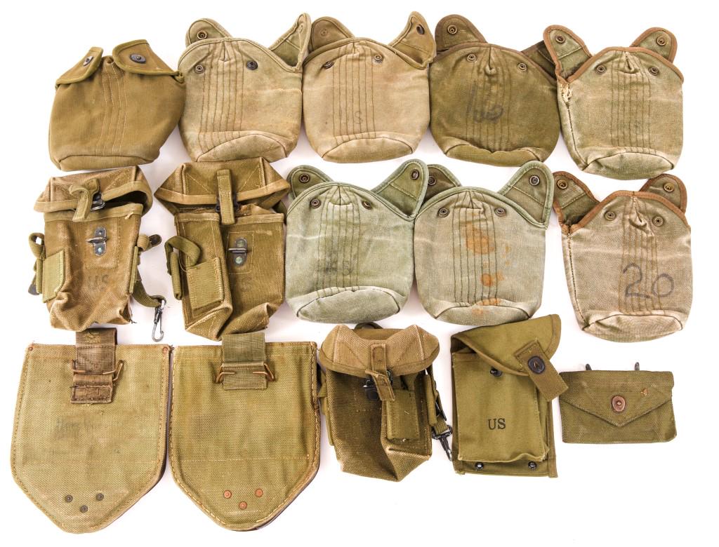 VIETNAM WAR EARLY CANVAS FIELD GEAR LOT OF 15: VIETNAM WAR EARLY CANVAS FIELD GEAR LOT OF 15 Vietnam War, US Army canvas field gear lot of fifteen. 8- OD green canteen pouches. 3- M56 magazine pouches. 1- M1 carbine 30 rounds magazine pouch. 2- en