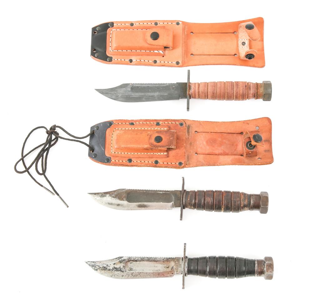 USAF PILOT SURVIVAL KNIFE LOT OF 3: USAF PILOT SURVIVAL KNIFE LOT OF 3 Desert Storm era, USAF Pilot survival knife, lot of three. 1- Camillus New York U.S.A. stamped on the ricasso, parkerized blade, leather sheath with sharpening stone