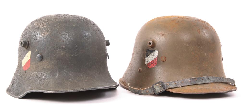 WWI GERMAN & AUSTRIAN M16 HELMET LOT OF 2: WWI GERMAN & AUSTRIAN M16 HELMET LOT OF 2 Lot of two refurbished M16 German and Austrian combat helmets. 1- WWI Refurbished Austrian M16 helmet, double decals, liner and chinstrap, stamped inside " B3