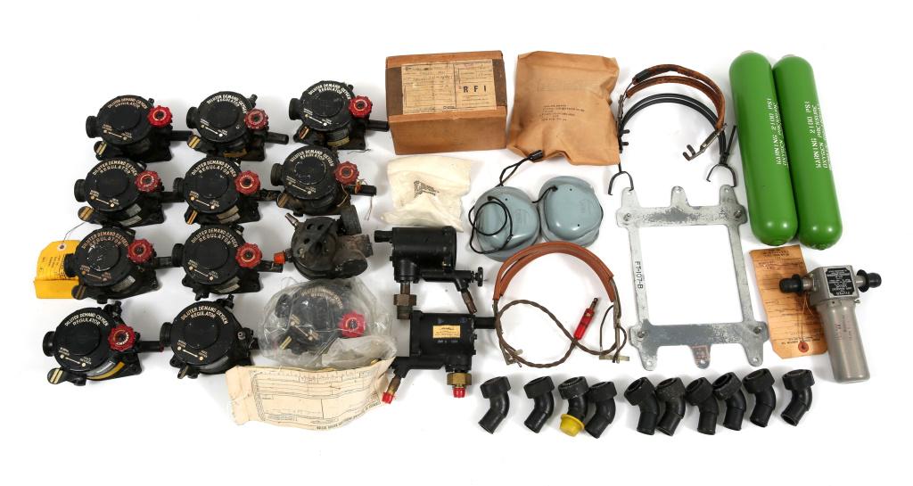 WWII - KOREAN WAR USAF INSTRUMENTS & PARTS LOT: WWII - KOREAN WAR USAF INSTRUMENTS & PARTS LOT WWII - Korean War, USAF instruments and parts lot, includes WWII A-12A oxygen regulators with elbows, " G " suit fitter, two C1 bailout bottles, pressure