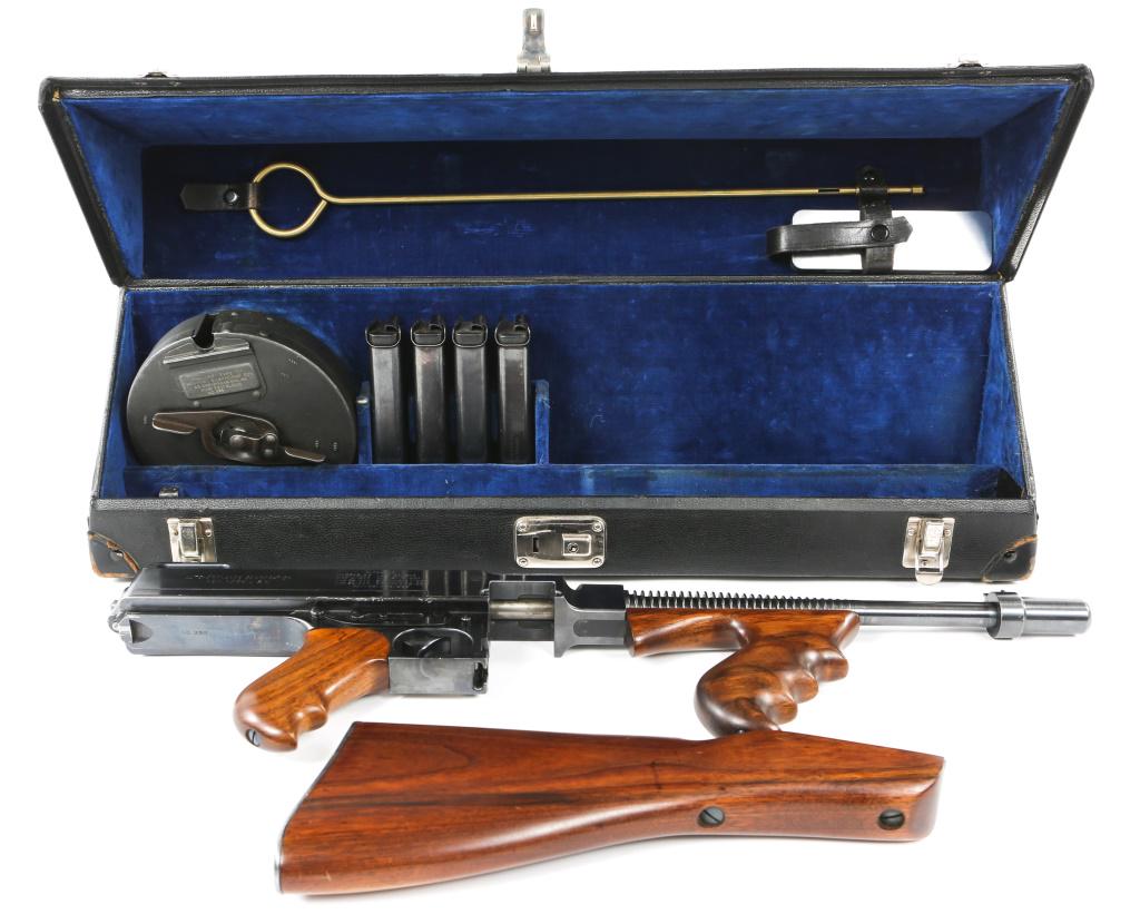 COLT M1921 .45 ACP THOMPSON SUBMACHINE GUN - NFA: COLT M1921 .45 ACP THOMPSON SUBMACHINE GUN - NFA Colt model 1921 .45 ACP Thompson submachine gun. An exceptional high-grade Colt model 1921 in original FBI blue velvet lined case, with transfer/trade 