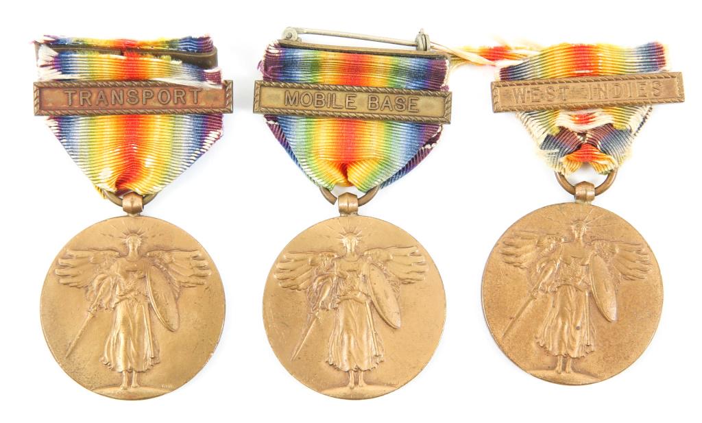 WWI US NAVY VICTORY MEDAL LOT OF 3: WWI US NAVY VICTORY MEDAL LOT OF 3 1- WWI USN victory medal, with Mobile Base bar, unnamed. 1- WWI USN victory medal, with Transport bar, unnamed. 1- WWI USN victory medal, with West Indies bar, unnam
