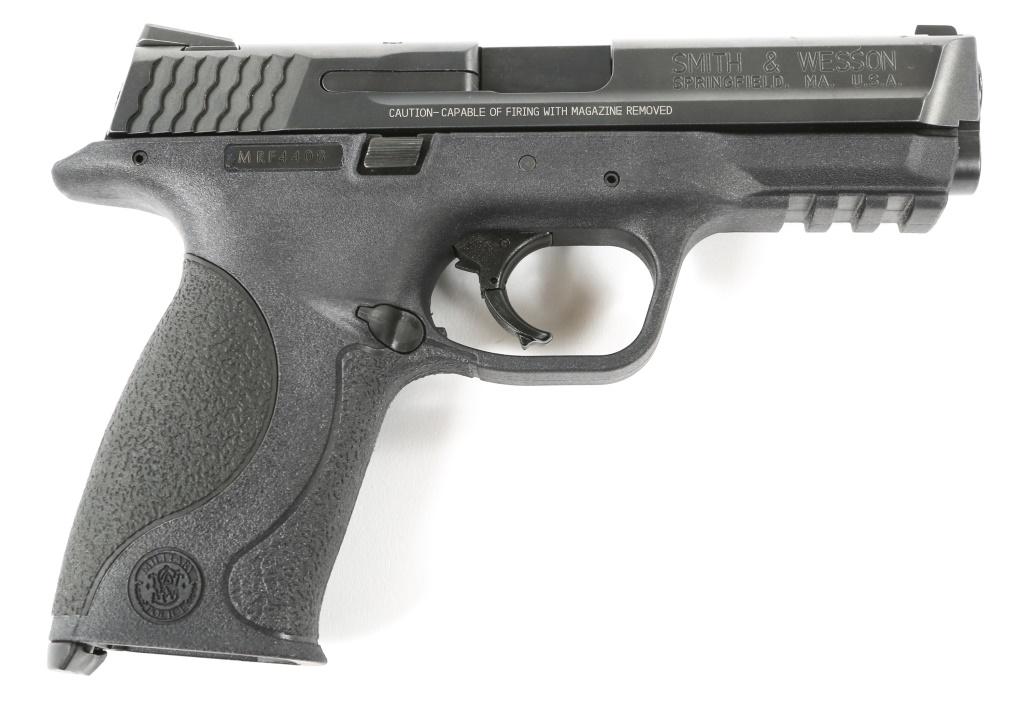 SMITH & WESSON MODEL M&P9 9mm PISTOL: SMITH & WESSON MODEL M&P9 9mm PISTOL Smith & Wesson M&P9 9mm pistol. Factory hard case and Smith & Wesson soft carry case. Four magazines. Factory palm swell grip attachments. Caliber / Gauge: 9mm Bar