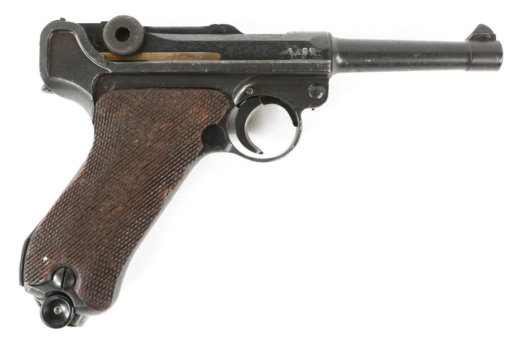 WWI IMPERIAL GERMAN DWM MODEL P08 9mm PISTOL: WWI IMPERIAL GERMAN DWM MODEL P08 9mm PISTOL 1914 WWI Imperial German DWM model P08 9mm pistol. Russian capture: "X" stamp next to serial number on receiver ring. One magazine. Magazine reads: "fxo," 
