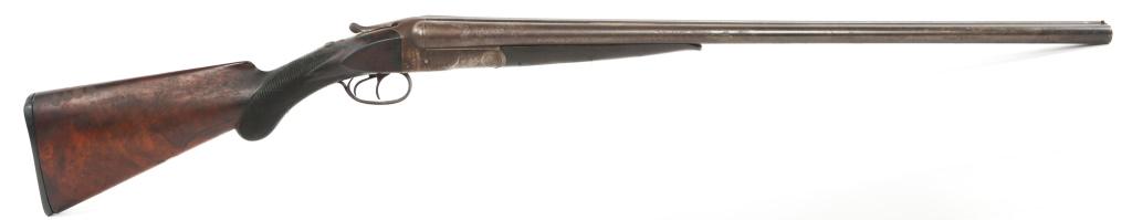 1889 COLT MODEL 1883 HAMMERLESS 12 GA SBS SHOTGUN: 1889 COLT MODEL 1883 HAMMERLESS 12 GA SBS SHOTGUN 1889 Colt model 1883 Hammerless 12 gauge side-by-side shotgun. 2.75" chamber. Barrel flat reads: "51695," and "12 I." Matching serial numbers. Walnut