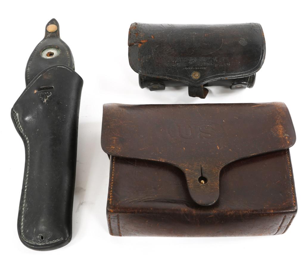 LEATHER HOLSTER AND POUCH LOT: LEATHER HOLSTER AND POUCH LOT One leather holster with B7A-46 PAT. PENDING BRASS stamped into leather on backside. Two US stamped leather ammo and flare pouches believed to be from Civil war and India