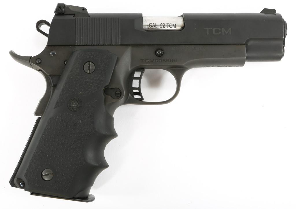 ROCK ISLAND MODEL TCM 1911-A2 .22 TCM PISTOL: ROCK ISLAND MODEL TCM 1911-A2 .22 TCM PISTOL Rock Island Armory model TCM 1911-A2 .22 TCM pistol, in original hard case with paperwork. Hogue grips, and original grips. One magazine. Caliber / Gauge: 