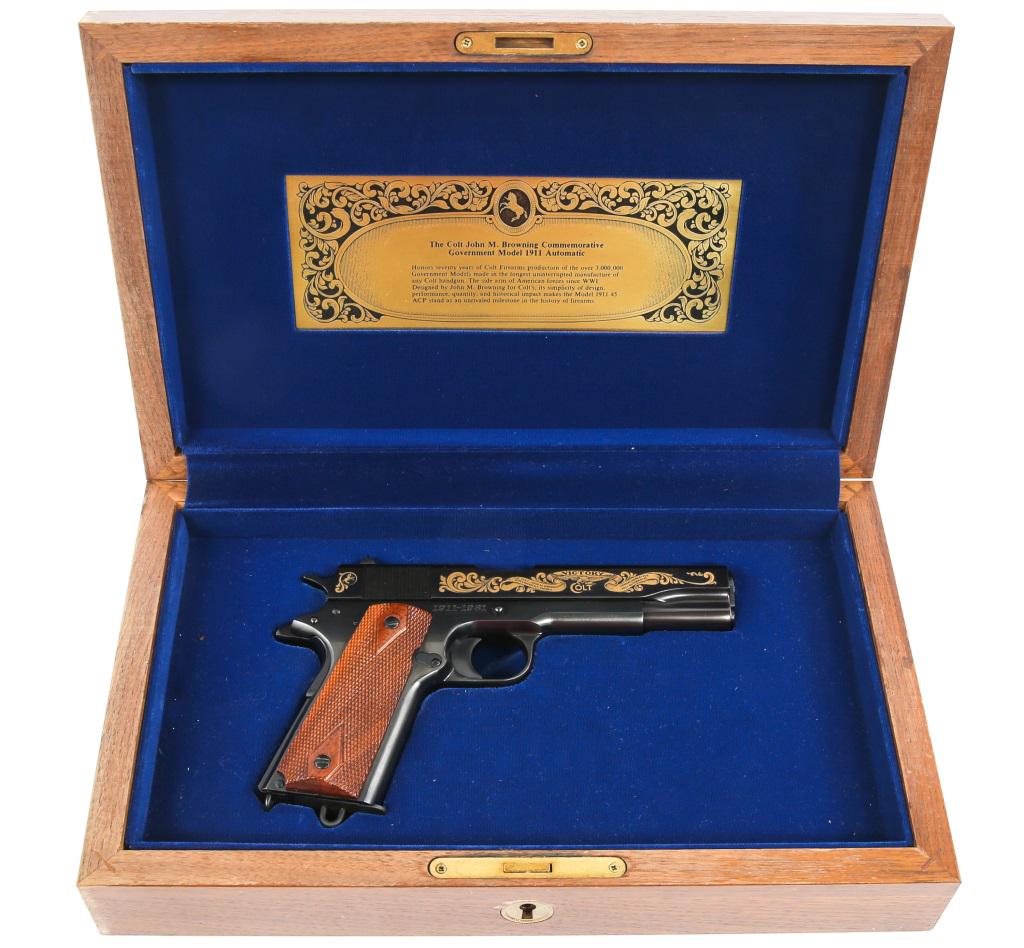 COLT JOHN M BROWNING GOVT MODEL 1911 PISTOL: COLT JOHN M BROWNING GOVT MODEL 1911 PISTOL Colt John M. Browning Government model 1911 .45 ACP pistol, in wooden display box, with original Colt box. One magazine. Lanyard loop on frame and magazine.