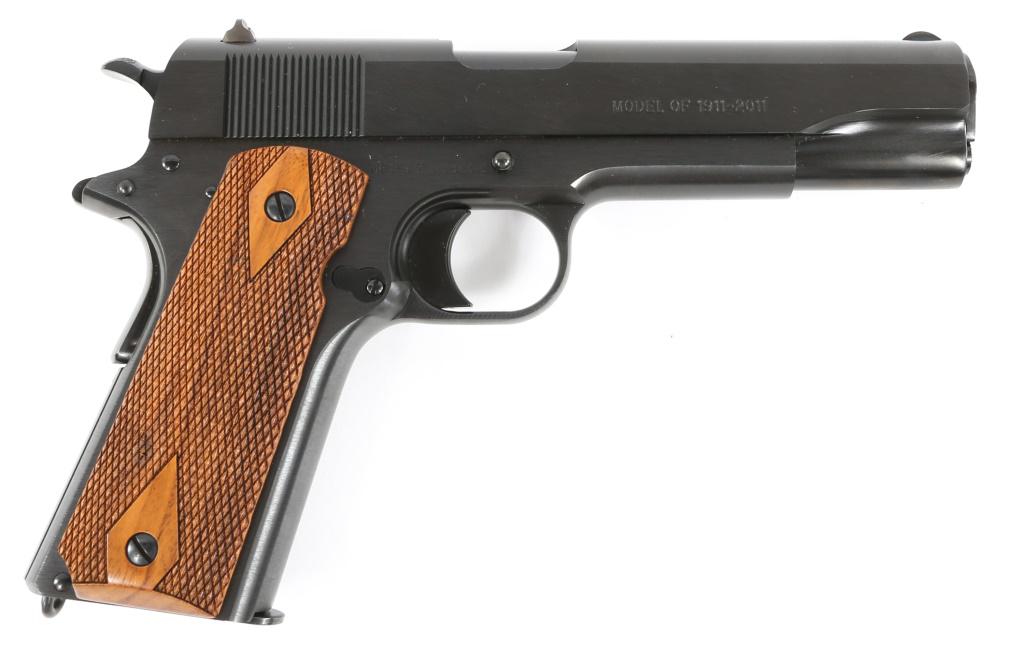 COLT MODEL OF 1911-2011 .45 ACP 100th ANNIV PISTOL: COLT MODEL OF 1911-2011 .45 ACP 100th ANNIV PISTOL Colt US Army Model 1911-2011 100 year anniversary .45 ACP pistol, in display case. Blued finish with checkered walnut grips. Slide reads: "Adopted Ma