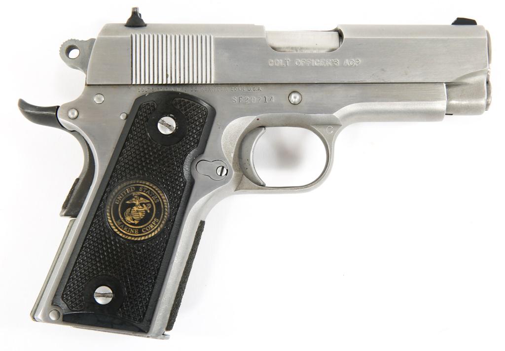 COLT MK IV SERIES 80 OFFICER'S .45 ACP PISTOL: COLT MK IV SERIES 80 OFFICER'S .45 ACP PISTOL Colt MK IV Series 80 Officer's .45 ACP pistol. Stainless finish. Black plastic grips with golden EGA and "United States Marine Corps" logo. One magazine. 