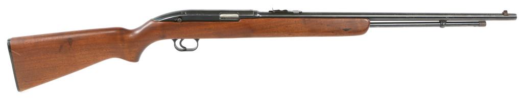 WINCHESTER MODEL 77 .22 LR CALIBER RIFLE: WINCHESTER MODEL 77 .22 LR CALIBER RIFLE Winchester model 77 .22 LR semi-automatic rifle. Walnut stock, and blued finish. Caliber / Gauge: .22 LR Barrel Length: 22" Serial Number: 39377
