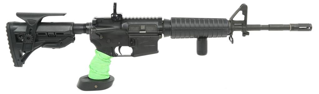 BUSHMASTER MODEL XM15-E2S 5.56mm RIFLE: BUSHMASTER MODEL XM15-E2S 5.56mm RIFLE Bushmaster model XM15-E2s 5.56mm rifle. Adjustable buttstock, target grip, foregrip, and rear peep sight. No magazine. Barrel 1/9 twist. Caliber / Gauge: 5.56mm 