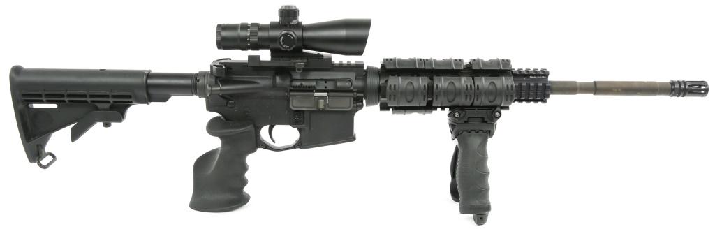 BUSHMASTER MODEL XM15-E2S 5.56mm RIFLE: BUSHMASTER MODEL XM15-E2S 5.56mm RIFLE Bushmaster model XM15-E2S 5.56mm rifle, with NcSTAR 3-9x42mm P4 Sniper scope. FAB Defense G2 T-Pod front grip/bipod, adjustable buttstock, target grip, 1/9 twist