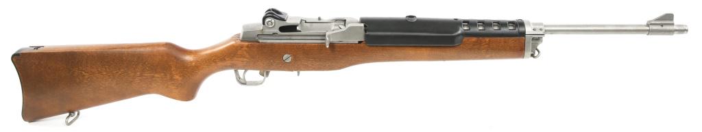 RUGER MODEL MINI-14 .223 REM STAINLESS RIFLE: RUGER MODEL MINI-14 .223 REM STAINLESS RIFLE Ruger model Mini-14 .223 Rem stainless rifle. Walnut stock. One magazine. Caliber / Gauge: .223 Rem Barrel Length: 18.5" Serial Number: 186-86097