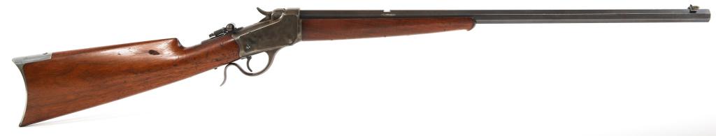1886 WINCHESTER M1885 .22 RF FALLING BLOCK RIFLE: 1886 WINCHESTER M1885 .22 RF FALLING BLOCK RIFLE 1886 Winchester model 1885 .22 RF falling block, single shot, low wall rifle. Octagonal barrel. Peep sights. Walnut stock. Barrel reads: "22 Cal. RF." 
