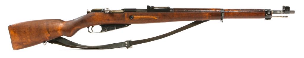 1942 WWII FINNISH VALMET M1939 7.62x54R RIFLE: 1942 WWII FINNISH VALMET M1939 7.62x54R RIFLE 1942 WWII Finnish Valmet model 1939 7.62x54R service rifle. Receiver ring stamped: (Finnish Army "SA" in rectangle) VKT Valmet logo, "D 58154 1942." Match