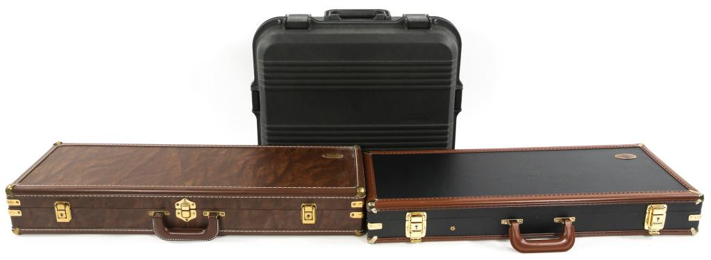 FIREARM HARDCASE MIXED LOT OF 3: FIREARM HARDCASE MIXED LOT OF 3 Two Browning shotgun hard cases, measuring 28"x10"x4" & 29.5"x9"x5". One Browning case is locked without key. One Doskocil handgun hard case, measuring 20"x16"x9". Size