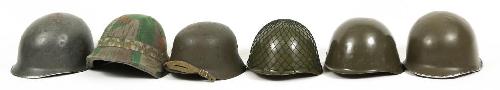 WORLD MILITARY ARMY COMBAT HELMET LOT OF 6: WORLD MILITARY ARMY COMBAT HELMET LOT OF 6 World Army Military combat helmet, lot of 6. Includes 1- WWII Spanish Army; 1- Swiss Army M18/40 with camo cover; 2- Hungarian M70; 2- West German M60.