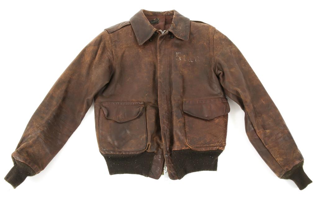 WWII AAF ACES "N" EIGHTS PAINTED A2 FLIGHT JACKET: WWII AAF ACES "N" EIGHTS PAINTED A2 FLIGHT JACKET WWII US Army 8th Air Force, 457Bomb Group A-2 leather flight jacket. Direct painting of the name " Stag " on the left breast. The back of the jacket f