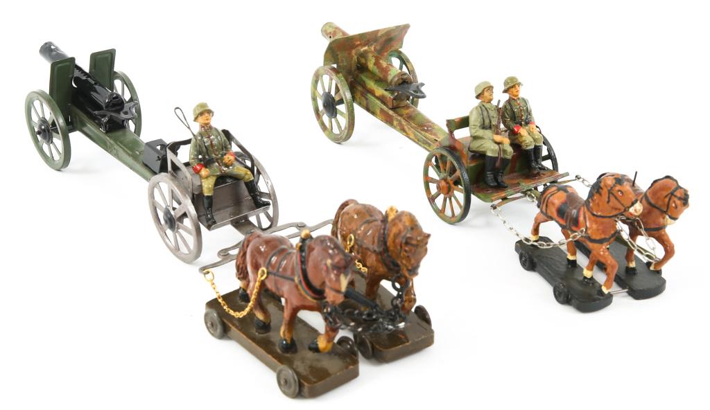 WWI GERMAN CANNON GERMAN MADE TOY FIGURE LOT: WWI GERMAN CANNON GERMAN MADE TOY FIGURE LOT WWI German soldiers with cannons and horses. D.R.G.M " Ideal " Made in Germany. Size: 65mm