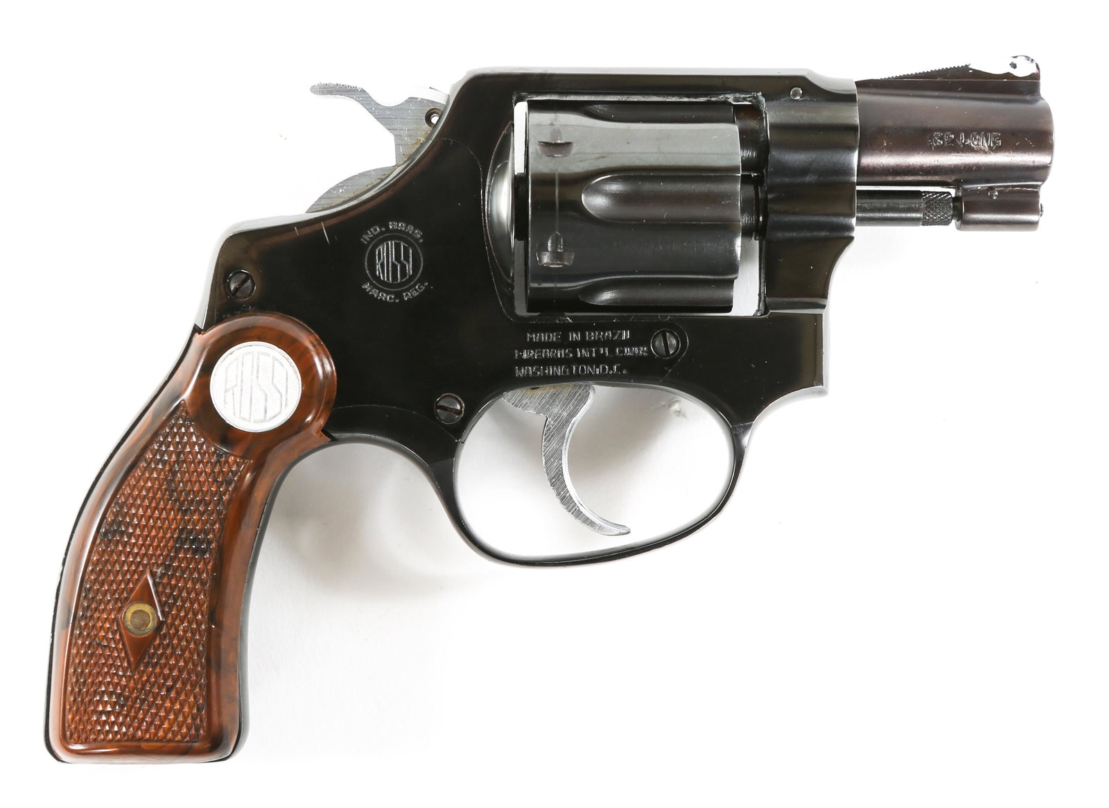 ROSSI .32 LONG 6-SHOT REVOLVER: ROSSI .32 LONG 6-SHOT REVOLVER Rossi .32 Long 6-shot revolver. Checkered plastic grips and blued finish. White paint on sights. Imported by Firearms International Corp. Caliber / Gauge: .32 Long Barre
