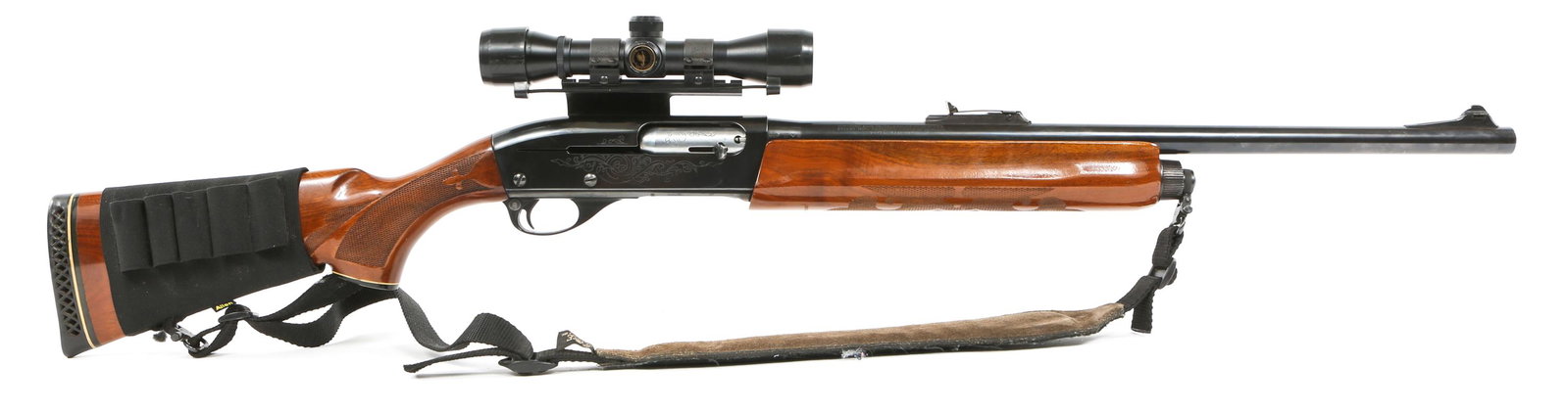 REMINGTON MODEL 1100 12 GA SEMI-AUTO SHOTGUN: REMINGTON MODEL 1100 12 GA SEMI-AUTO SHOTGUN Remington model 1100 12 gauge semi-automatic shotgun, with Simmons ProDiamond 4x32mm shotgun scope. Weaver S3 scope mount. Weathercraft sling. 2.75" chambe