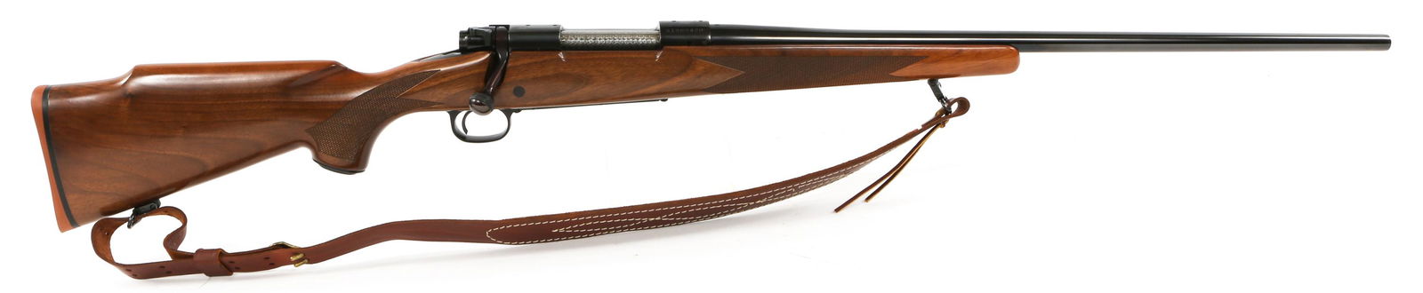 WINCHESTER M70 XTR .300 WBY MAG BOLT-ACTION RIFLE: WINCHESTER M70 XTR .300 WBY MAG BOLT-ACTION RIFLE Winchester model 70 XTR bolt action rifle chambered in .300 Weatherby magnum. Leather sling. Bolt is electro penciled to match serial number on receiv