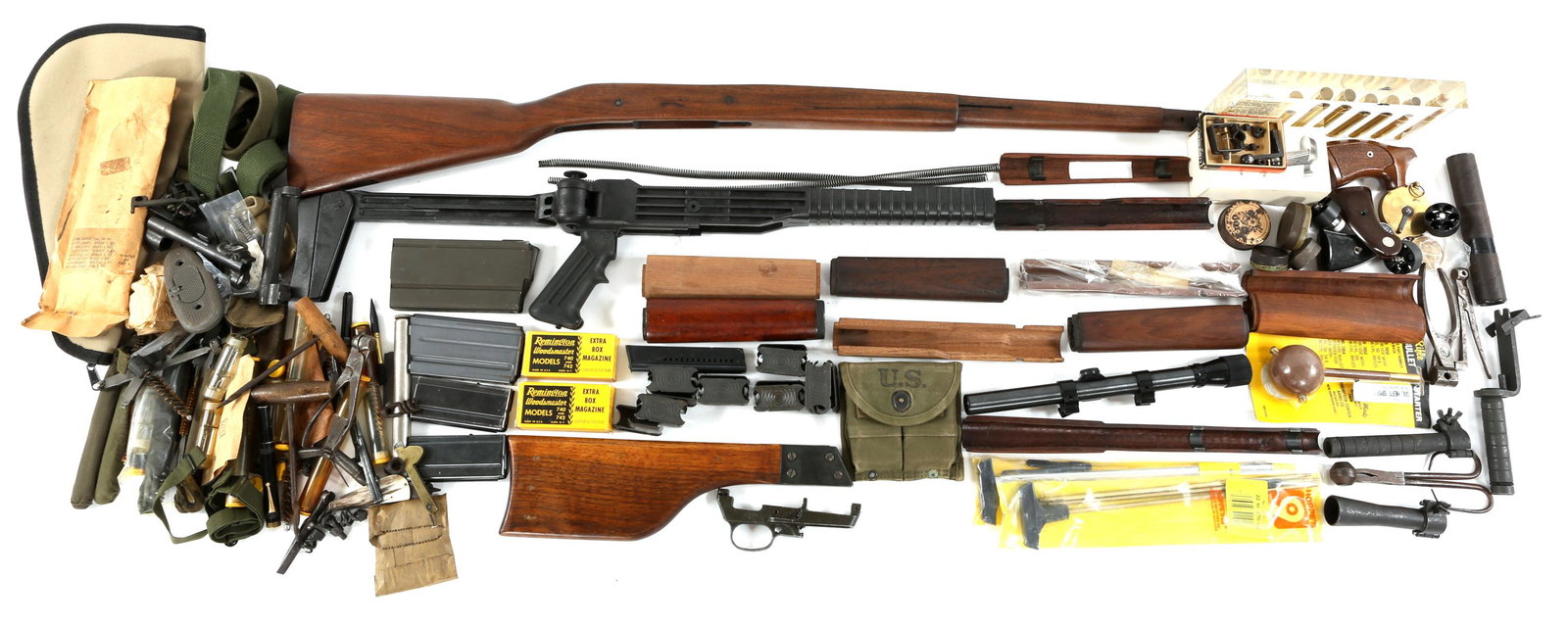 FIREARM PARTS, TOOLS, MAGAZINES & ACCESSORIES: FIREARM PARTS, TOOLS, MAGAZINES & ACCESSORIES Assorted firearm related items, including: -Nine M1 Garand enbloc clips. -One WWII US M1 Carbine magazine pouch with 2 K.I. marked 15rd magazines, pouch s