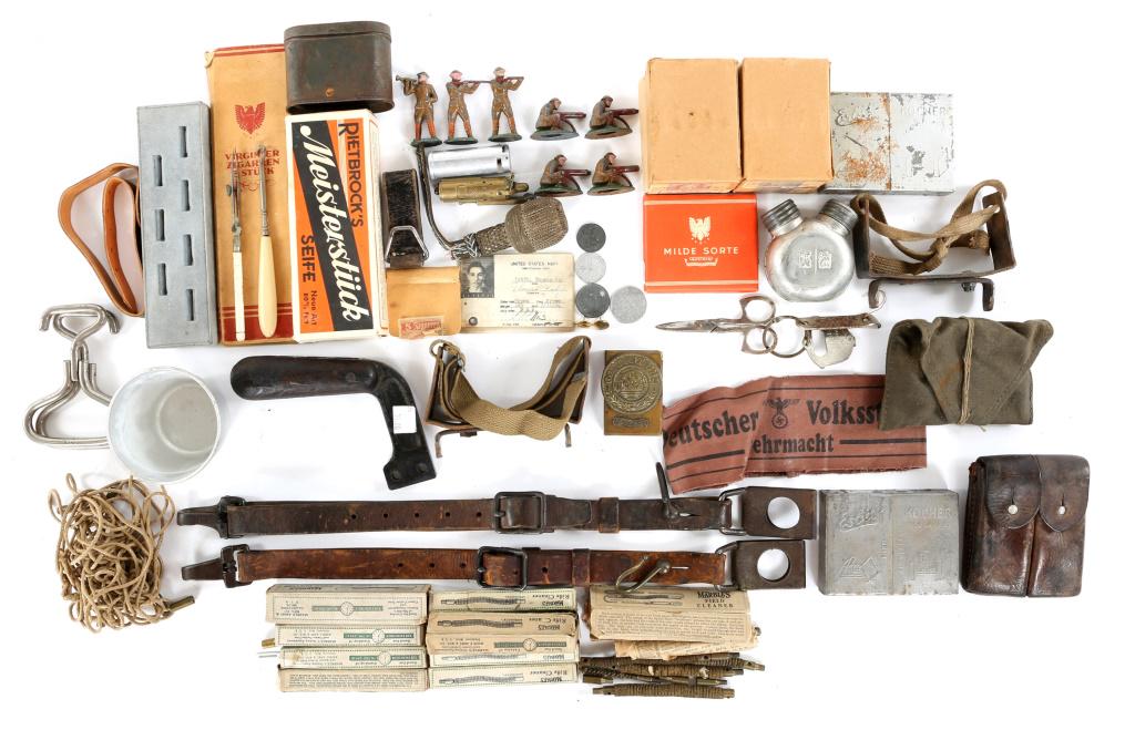 WWII GERMAN ASSORTED GEAR LOT: WWII GERMAN ASSORTED GEAR LOT WWII lot of assorted German items. 1- Aluminum cup with Luftwaffe stamp on bottom, dated 1942. 1- C96 Mauser magazine pouch. 1- box of WWII German Cigars. 1- box WWII Aus