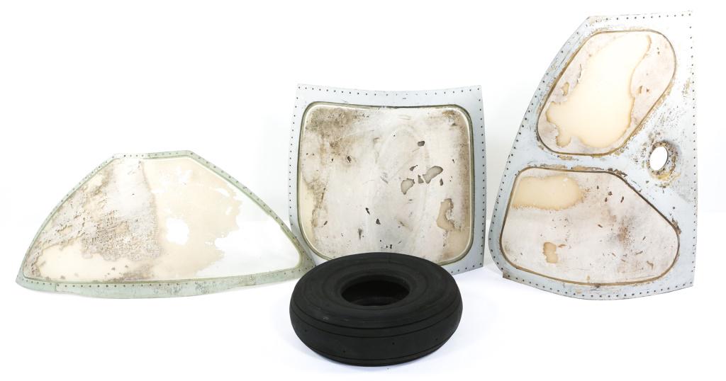 USAF JET PLANE REPLACEMENT CANOPY & AIRCRAFT TIRE: USAF JET PLANE REPLACEMENT CANOPY & AIRCRAFT TIRE Lot of 3 unidentified Jet plane canopy replacement & 1 aircraft tire.