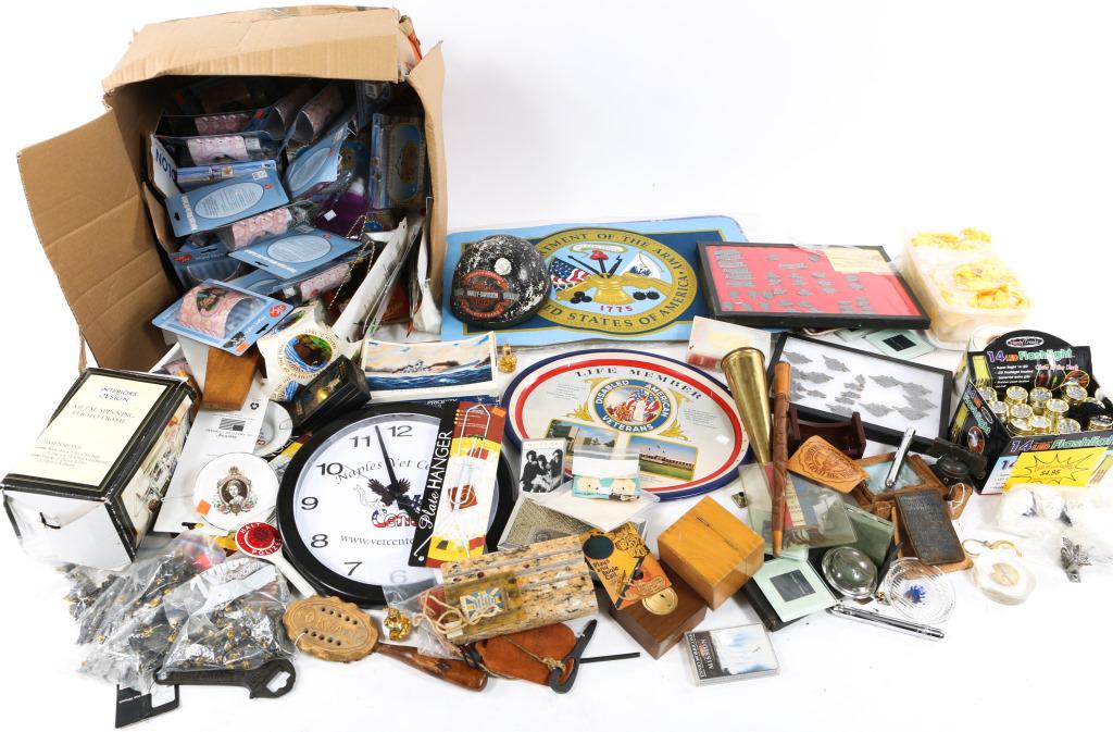 NOVELTY ITEMS LARGE LOT: NOVELTY ITEMS LARGE LOT Various novelty items. Glow in the dark flashlights, plate holders, welcome signs, night lights, veteran items, and Harley Davidson pins, etc...