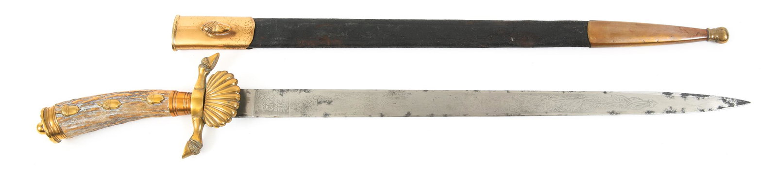 IMPERIAL GERMAN ETCHED HUNTING DAGGER BY W.K.C.: IMPERIAL GERMAN ETCHED HUNTING DAGGER BY W.K.C. Hirschfanger, stag handle adorned with acorns, hoof patterned hilt, harvest & hunt themed etching. Blade is marked "W.K.C." below suit of armor helmet i
