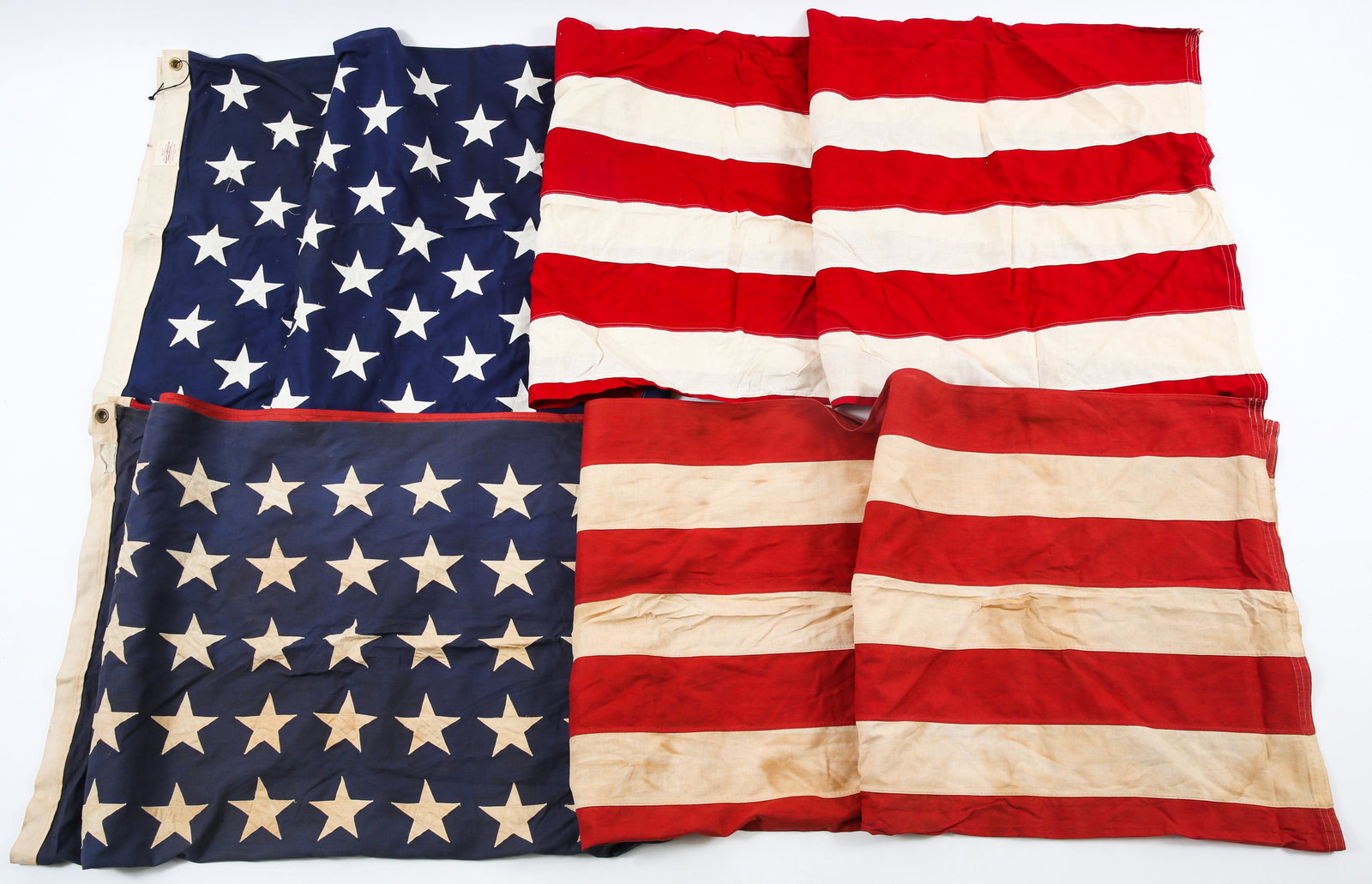 AMERICAN FLAGS WITH 48 & 50 STARS LOT OF 2: AMERICAN FLAGS WITH 48 & 50 STARS LOT OF 2 Both are multiple piece, double sided construction manufactured by " Valley Forge Flag Company ". Size: 5' x 8'