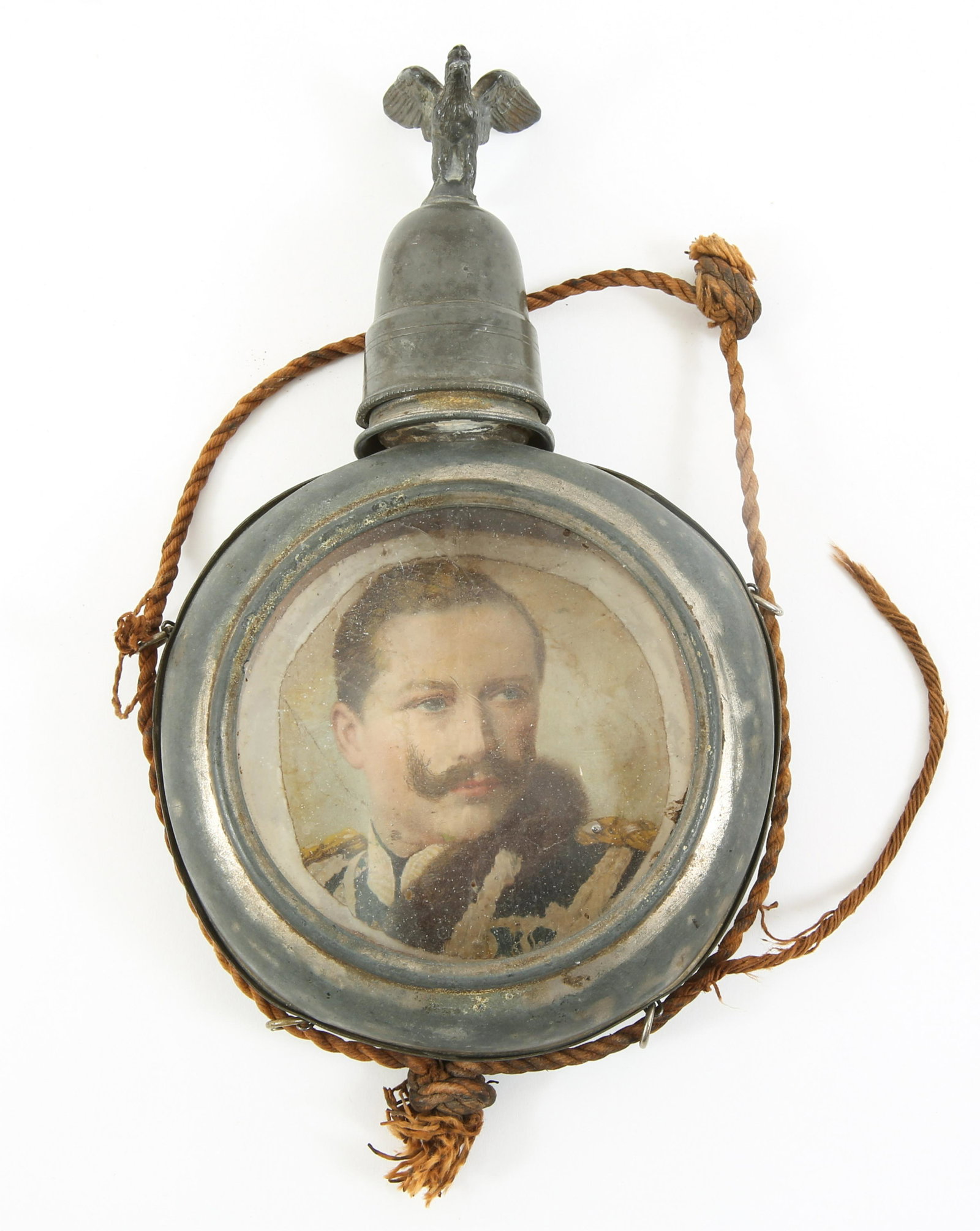 WWI GERMAN SCHNAPPS LIQUOR FLASK WITH CUPS & CAP: WWI GERMAN SCHNAPPS LIQUOR FLASK WITH CUPS & CAP German WWI Schnapps Liquor Flask complete with Cups and Cap. Flask bears the image of a female regent and through the glass backing the image of a male