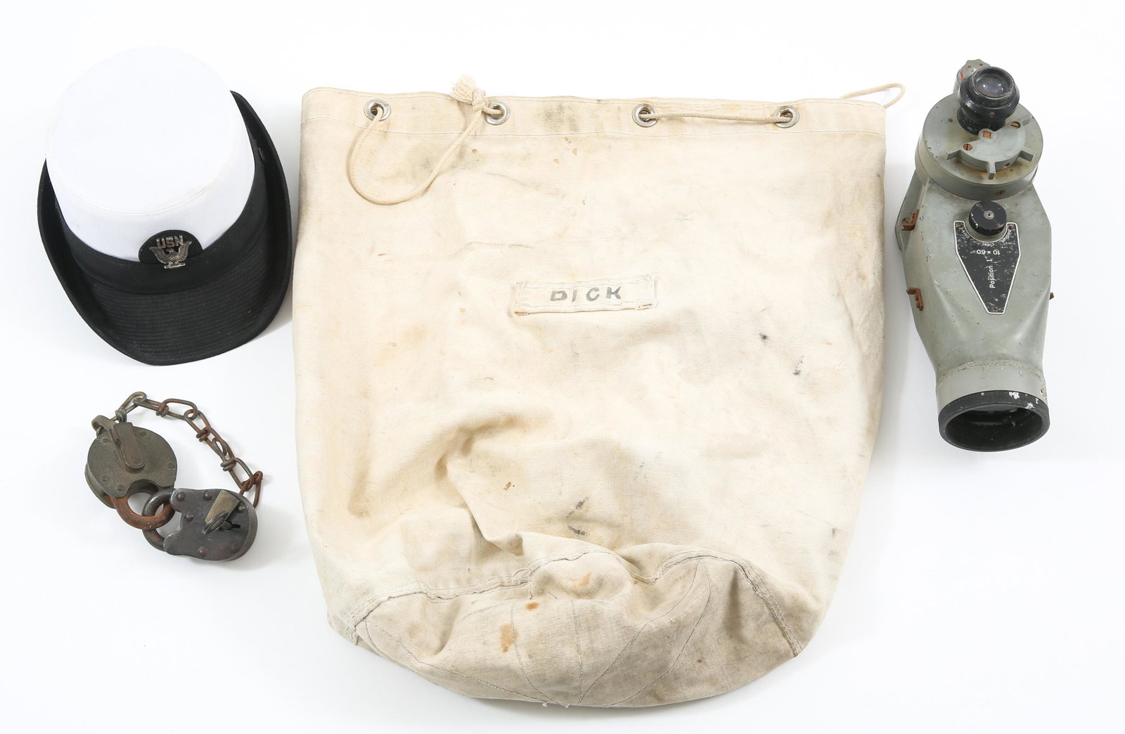 US NAVY GUNSIGHT, HAT & SEABAG LOT: US NAVY GUNSIGHT, HAT & SEABAG LOT US Navy lot of 5. 1- USN gunsight; 1- US Navy female hat; 1 US Navy personal effect seabag; 1- lot of 2 antique locks.