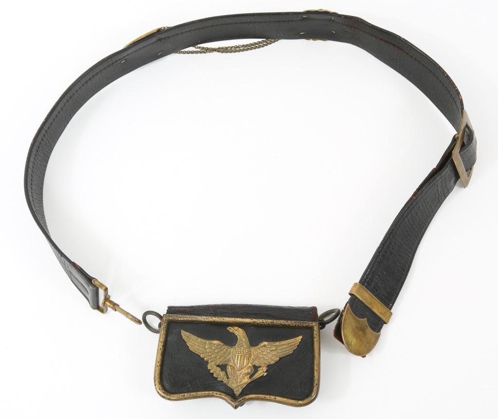 US INDIAN WARS SERVICE DRESS BELT & CARTRIDGE BOX: US INDIAN WARS SERVICE DRESS BELT & CARTRIDGE BOX Cartridge box is marked with US federal eagle, and brass fittings 5.5'' in horizontal width 4" in vertical length. Black leather belt bears rampant li