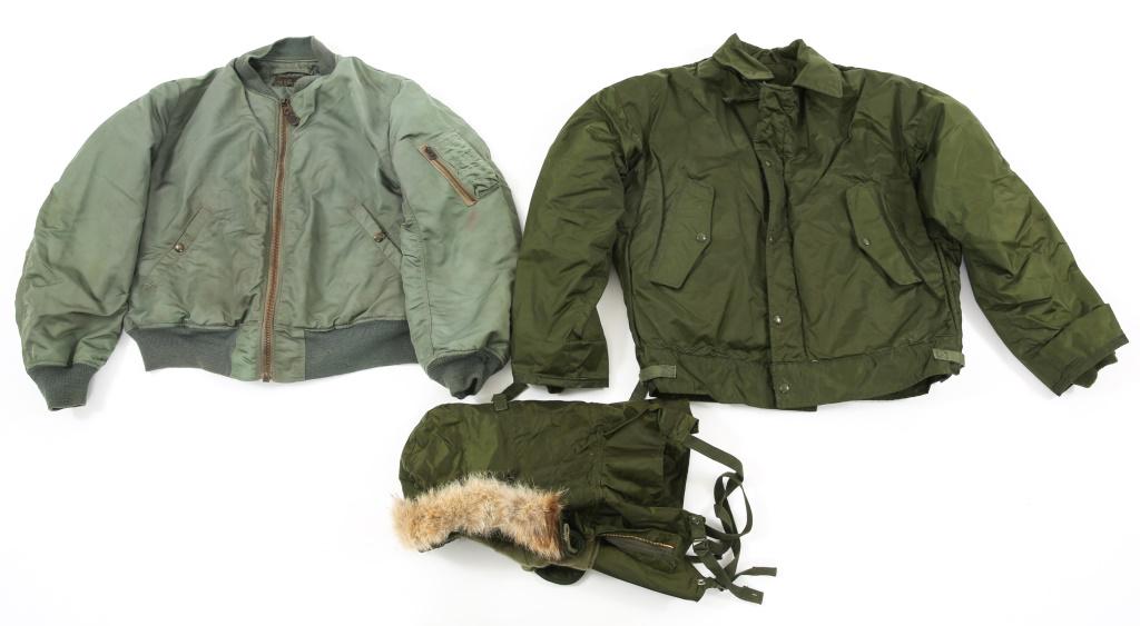 KOREA MA1 BOMBER & VIETNAM A1 EXTREME COLD WEATHER: KOREA MA1 BOMBER & VIETNAM A1 EXTREME COLD WEATHER (1) Korean War era type MA-1 Flying Bomber Jacket, Size : Large. (2) Extreme Cold Weather (Shore) Type A-1 insulated jacket and hood. Jacket is compl