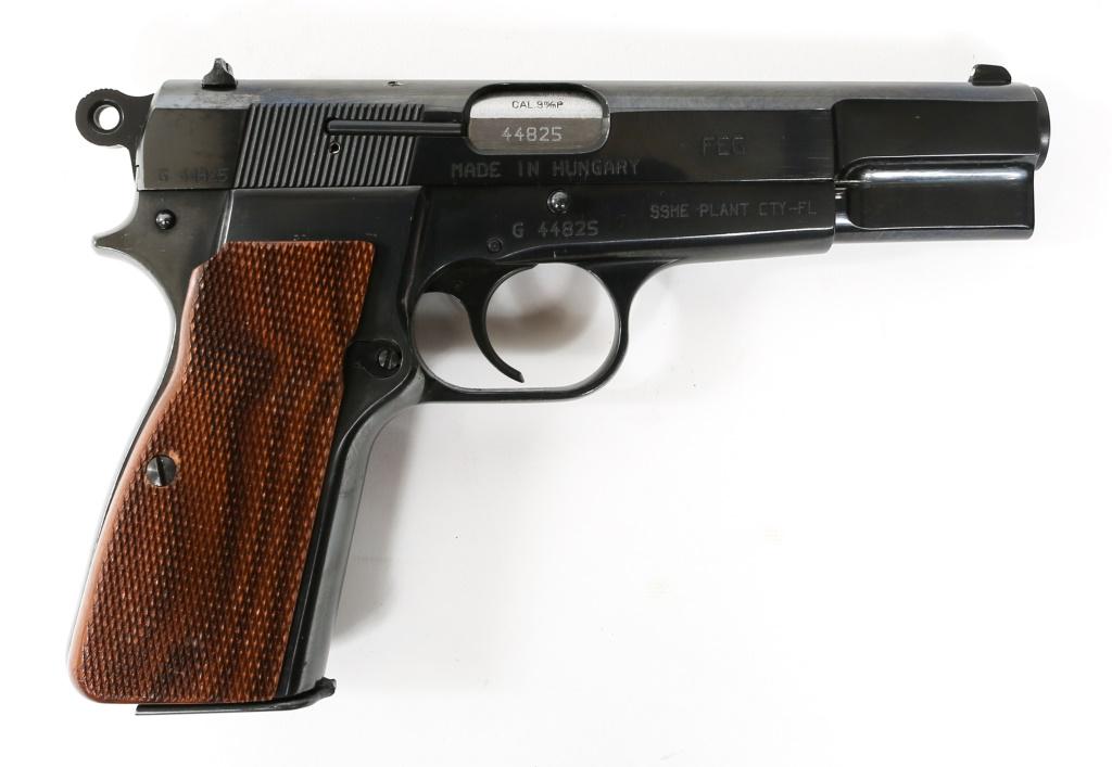 FEG MODEL P9M 9mm HI-POWER PISTOL: FEG MODEL P9M 9mm HI-POWER PISTOL Hungarian made FEG model P9M 9mm semi-automatic hi-power pistol, with hard case, extra P40 .40 S&W slide, barrel and springs. Two magazines. Slide reads: "G 44825 Mad