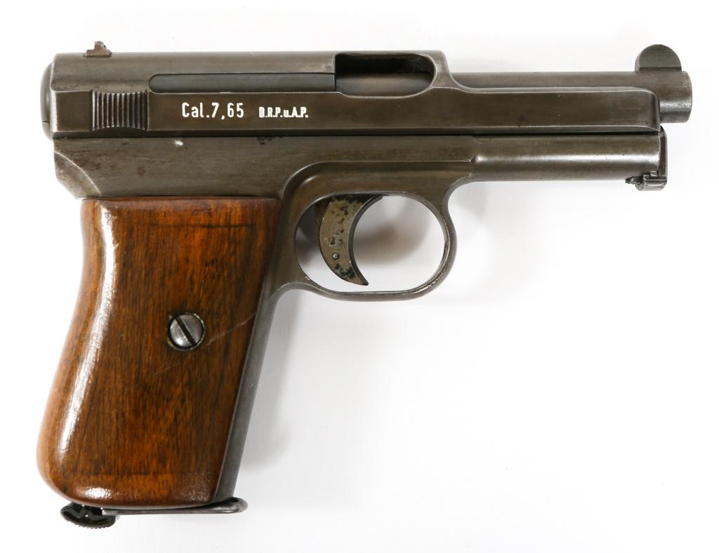 WWII GERMAN MAUSER MODEL 1934 7.65mm PISTOL: WWII GERMAN MAUSER MODEL 1934 7.65mm PISTOL WWII German model 1934 7.65mm semi-automatic pistol. Left side of frame stamped with "Mauser"," German eagle and waffenamt "655." Left side of slide reads: 