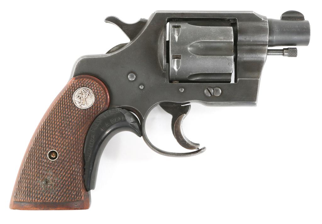 WWII COLT COMMANDO .38 SPL DA 2" BARREL REVOLVER: WWII COLT COMMANDO .38 SPL DA 2" BARREL REVOLVER Manufactured in 1942. Colt Commando double action .38 Special revolver, with 2" barrel. Matching serial numbers. Trigger guard has been modified for ea