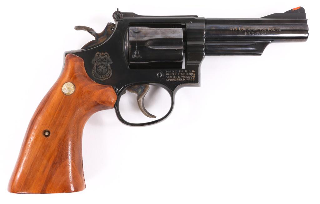 SMITH & WESSON MODEL 19 NYS CONSERVATION REVOLVER: SMITH & WESSON MODEL 19 NYS CONSERVATION REVOLVER Smith & Wesson Model 19-4 New York State Environmental Conservation Police Double Action Revolver. The lot includes walnut NYS Environmental Conservat
