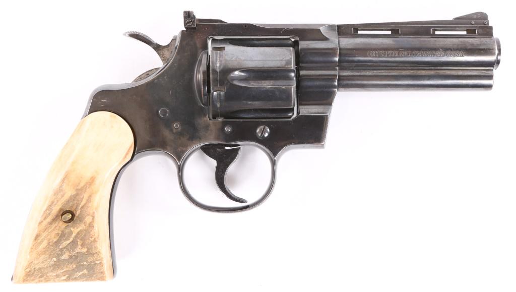 1969 COLT PYTHON 357 .357 MAGNUM REVOLVER: 1969 COLT PYTHON 357 .357 MAGNUM REVOLVER 1969 Colt Python 357 .357 magnum 6-shot revolver. Revolver features blued finish, stag grips, matching serial numbers on frame and crane. Left side of barrel