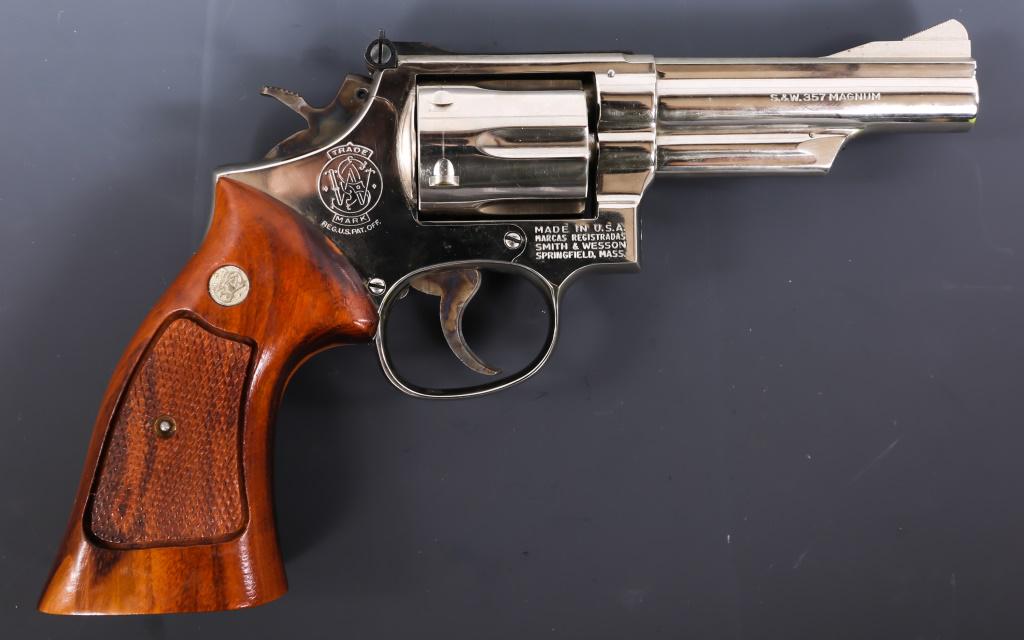 SMITH & WESSON MODEL 19-3 .357 MAGNUM REVOLVER: SMITH & WESSON MODEL 19-3 .357 MAGNUM REVOLVER Smith & Wesson Model 19-3 .357 Magnum Double Action Revolver. The lot includes original box and manual. The revolver features a nickel finish, checkered