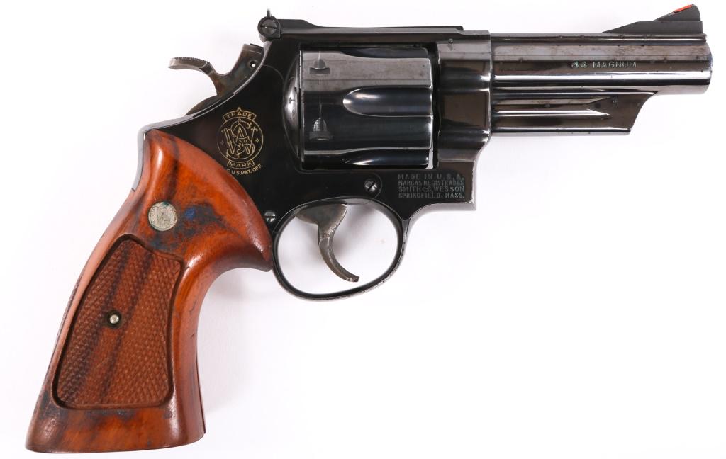 SMITH & WESSON MODEL 29-2 .44 MAGNUM DA REVOLVER: SMITH & WESSON MODEL 29-2 .44 MAGNUM DA REVOLVER Smith and Wesson Model 29-2 .44 Magnum Revolver. The revolver includes checkered wooden target grips, blued finish, adjustable rear sights and six roun