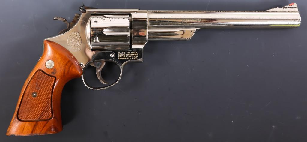 SMITH & WESSON MODEL 29-2 .44 MAGNUM REVOLVER: SMITH & WESSON MODEL 29-2 .44 MAGNUM REVOLVER Smith & Wesson Model 29-2 .44 Magnum Double Action Revolver. The lot includes wood case with cleaning rod. The revolver features Nickel finish, adjustable