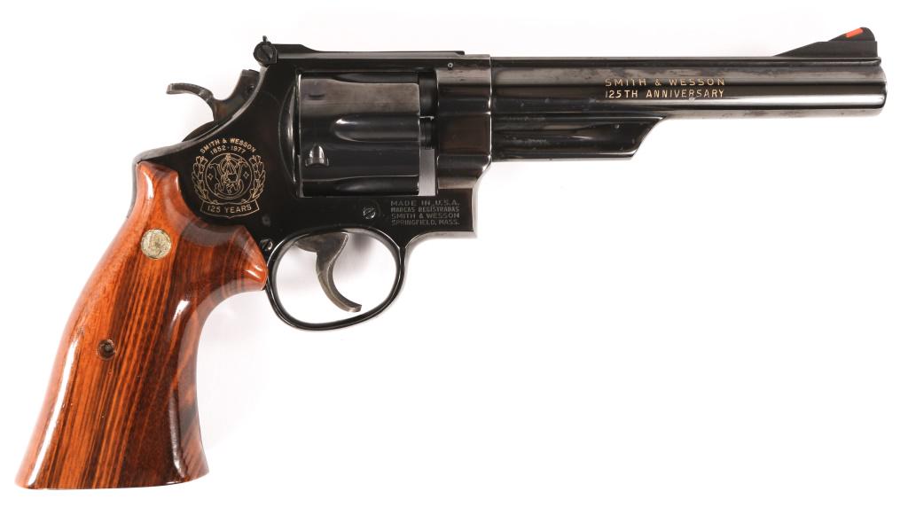 SMITH & WESSON MODEL 25-3 .45 LC REVOLVER: SMITH & WESSON MODEL 25-3 .45 LC REVOLVER Smith & Wesson Model 25-3 .45 LC 125th Anniversary Commemorative Double Action Revolver. The lot includes commemorative walnut case and book. The revolver fea