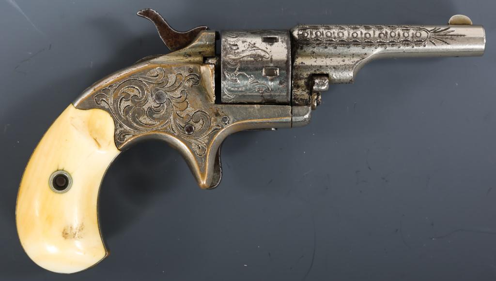 1876 COLT OPEN TOP POCKET MODEL .22 CAL REVOLVER: 1876 COLT OPEN TOP POCKET MODEL .22 CAL REVOLVER 1876 Colt Open Top Pocket model .22 caliber 7-shot revolver. Revolver features nickel plated brass frame, barrel, and cylinder with period floral engra