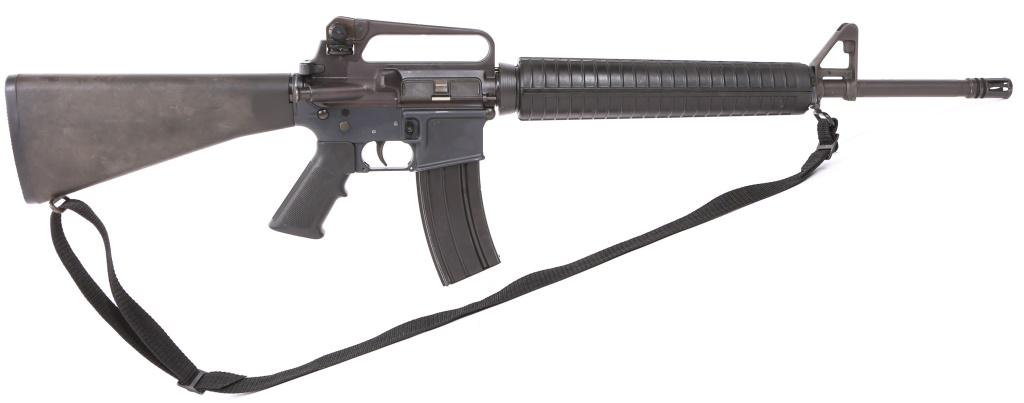 COLT MODEL AR-15 A2 GOVERNMENT CARBINE: COLT MODEL AR-15 A2 GOVERNMENT CARBINE Colt model AR-15 A2 Government carbine. Semi automatic rifle chambered in .223/5.56. Barrel marked "C /5.56 NATO/ 1/7". Features a Bird cage muzzle device, integ